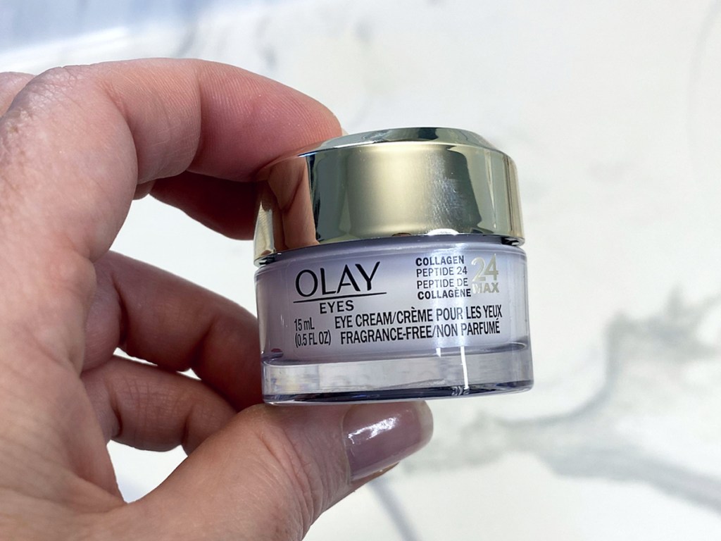 hand holding Olay Collagen Peptide 24 MAX Eye Cream