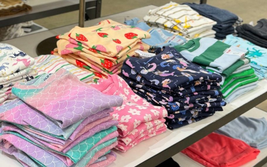 Table of folded kids tees at Old Navy