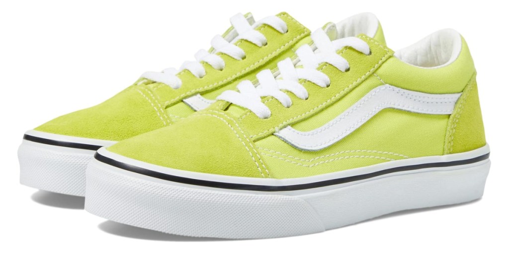 green sneakers with a white stripe