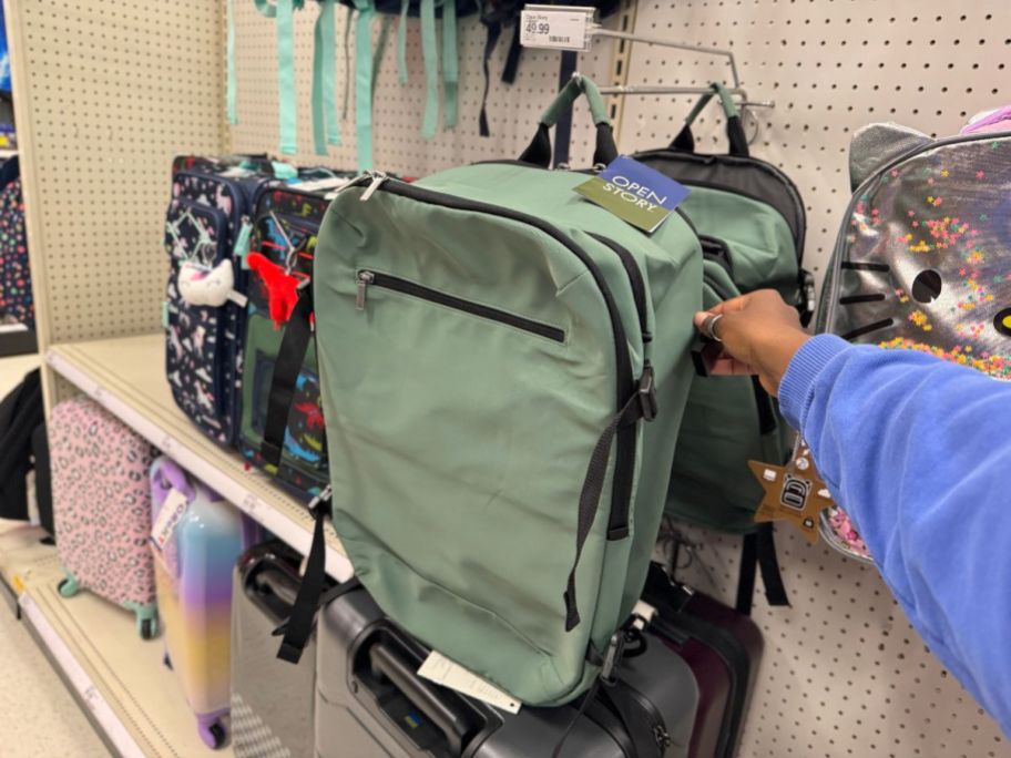 A green Open Story Travel backpack in Target