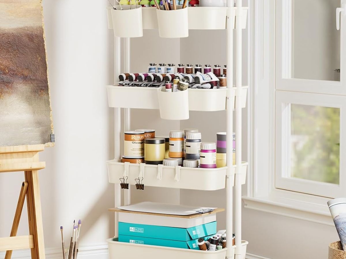 white 4-shelf rolling cart with paint supplies in it