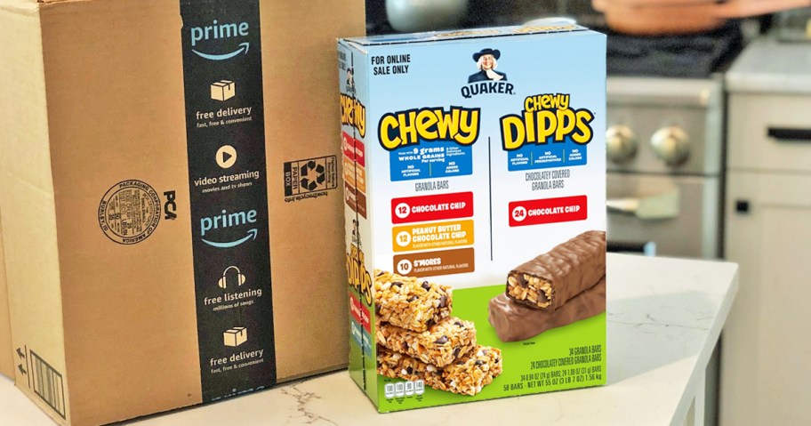 large box of Quaker Chewy Granola Bars on kitchen counter in front of amazon box