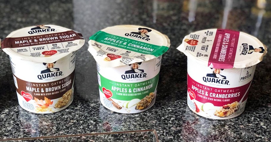 3 flavors of Quaker Instant Oatmeal Cups on kitchen counter
