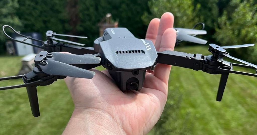 Hand holding a Radclo drone