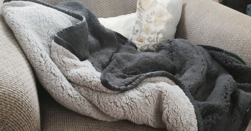 gray sherpa throw on couch