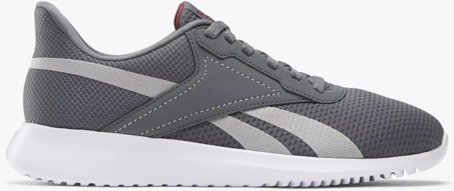 grey reebok sneaker with light grey stripes