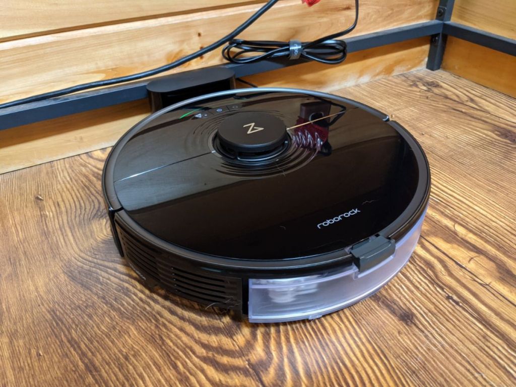 roborock robot vacuum on wood floor