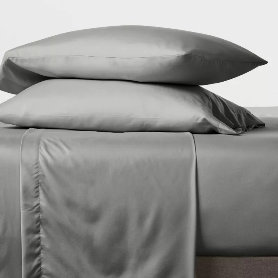 gray sheets and pillows