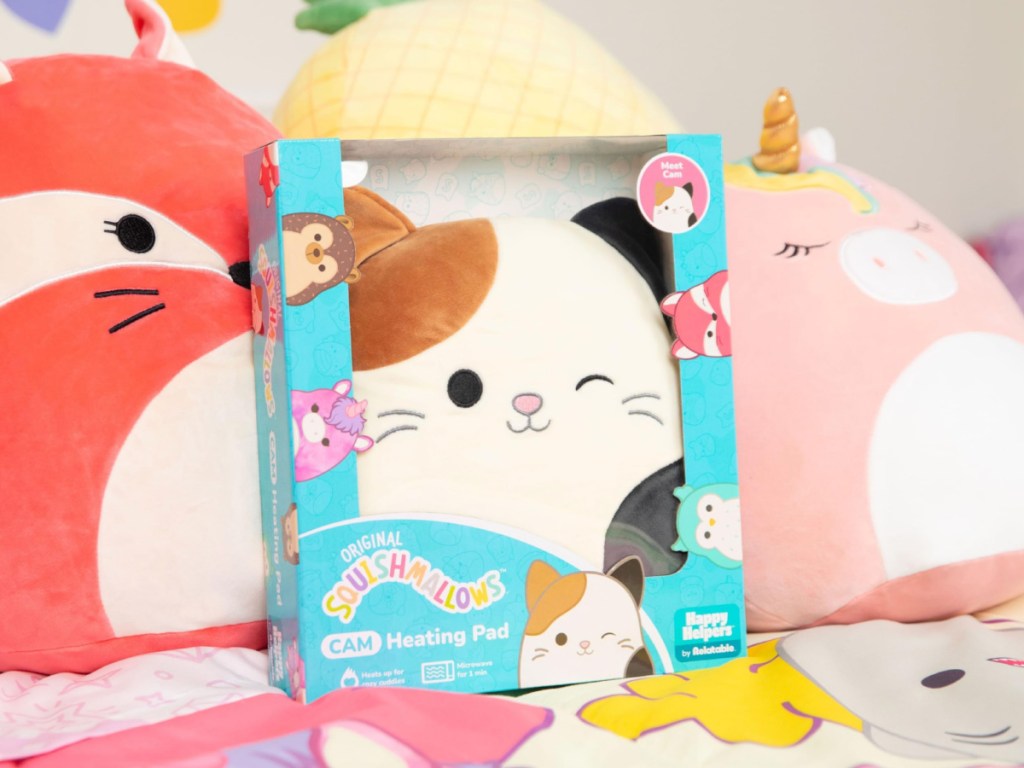 Squishmallows Cam Heating Pad in box on bed