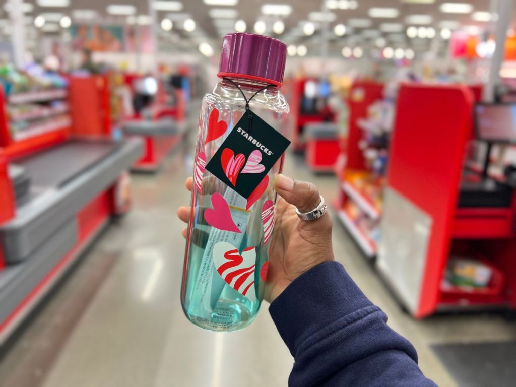 Starbucks Valentine's Day Water Bottle with Hearts in person's hand at Target