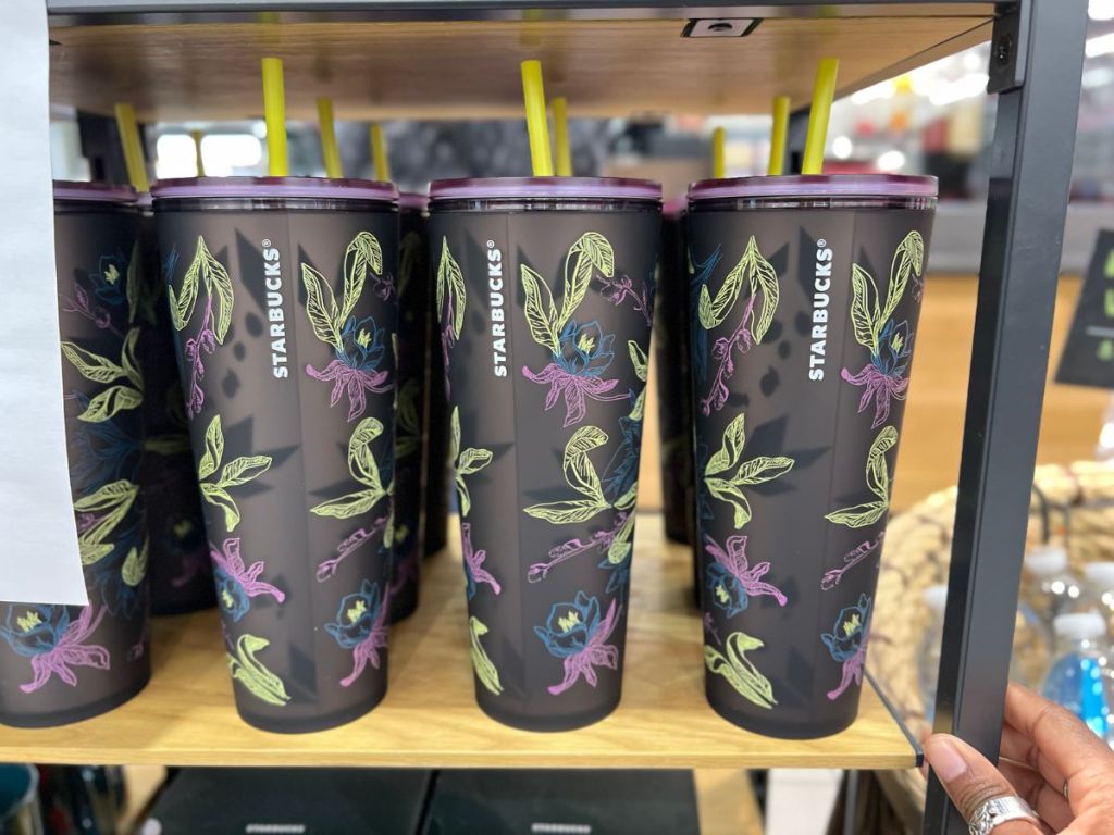 black Starbucks Tumbler with green and purple foliage design