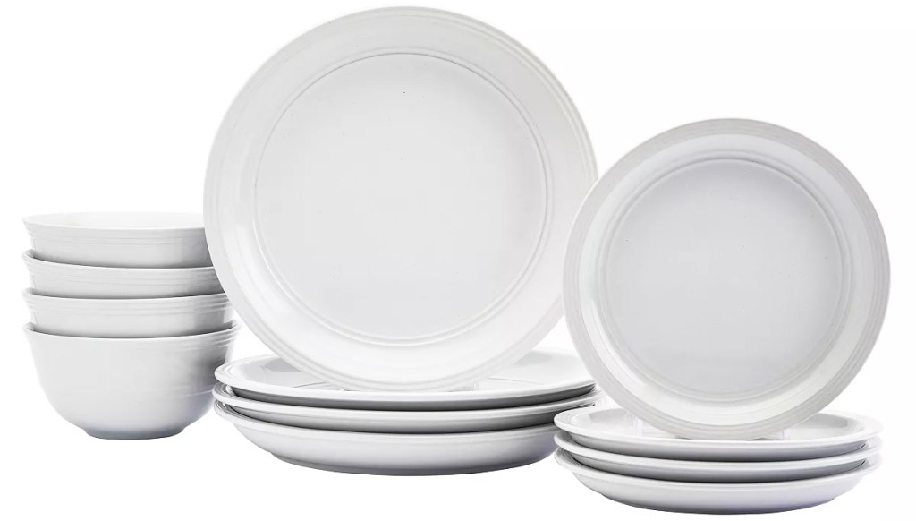 stacks of white dinner plates, salad plates, and bowls