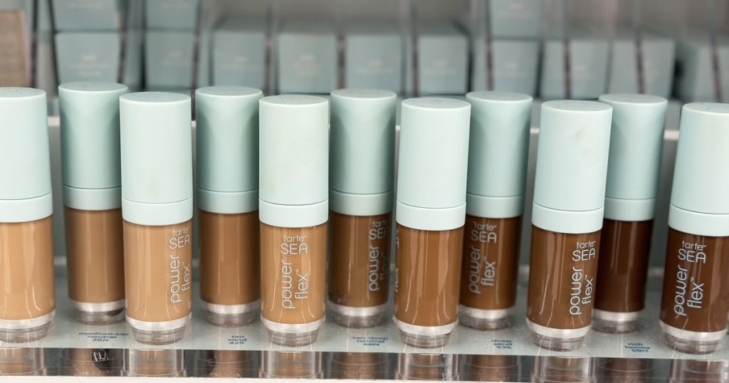 row of tarte concealer shades in store