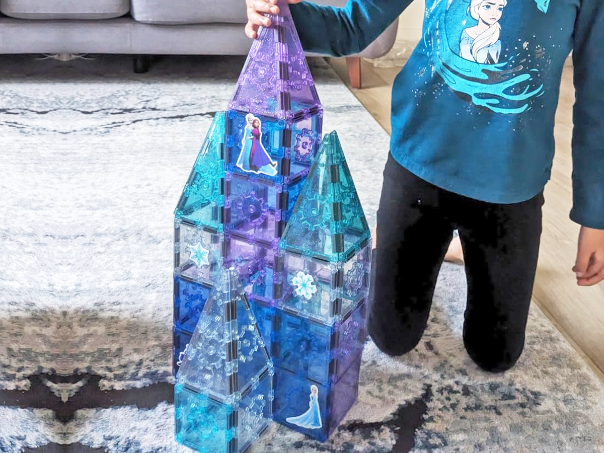 castle made from magnetic tiles set covered in disney frozen stickers