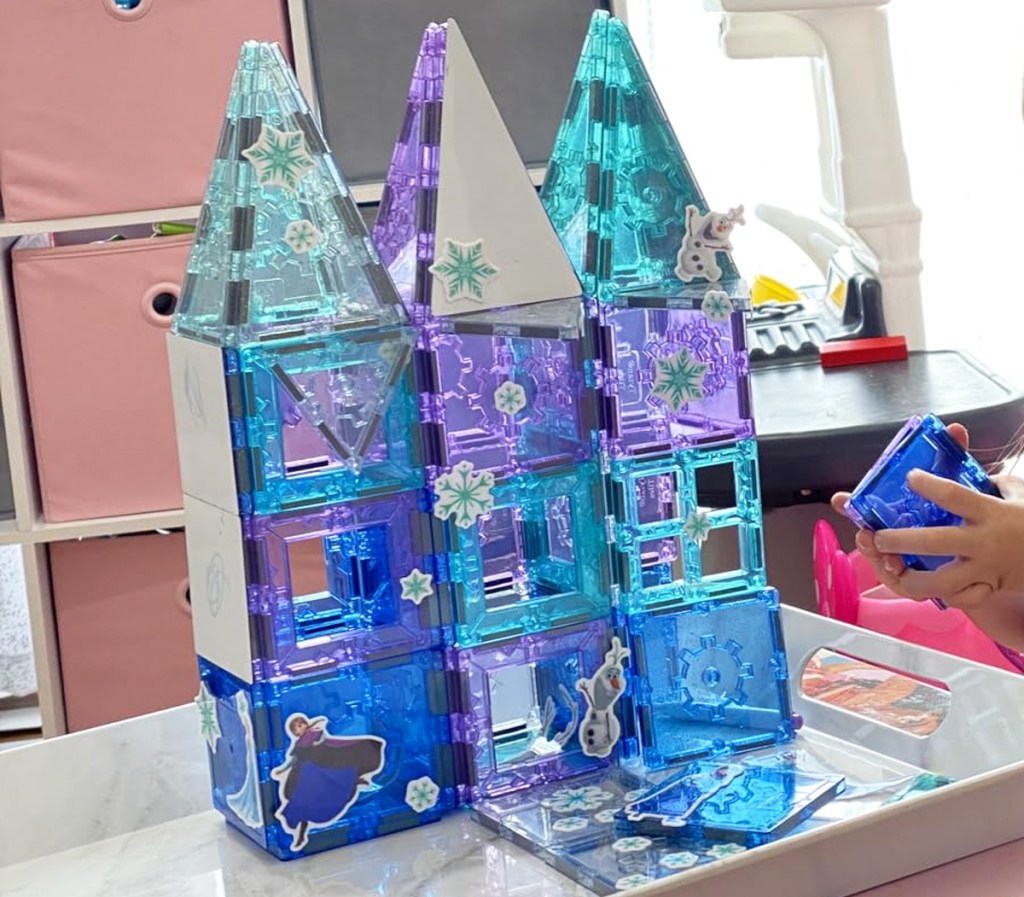 castle made from magnetic tiles set covered in disney frozen stickers