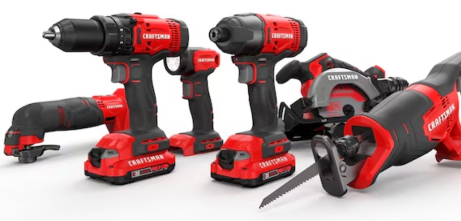 a variety of red and black Craftsman power tools, drills, small saw and more