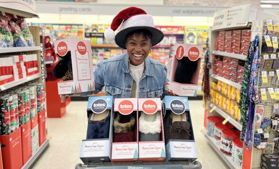 a woman with a shopping cart filled with slippers