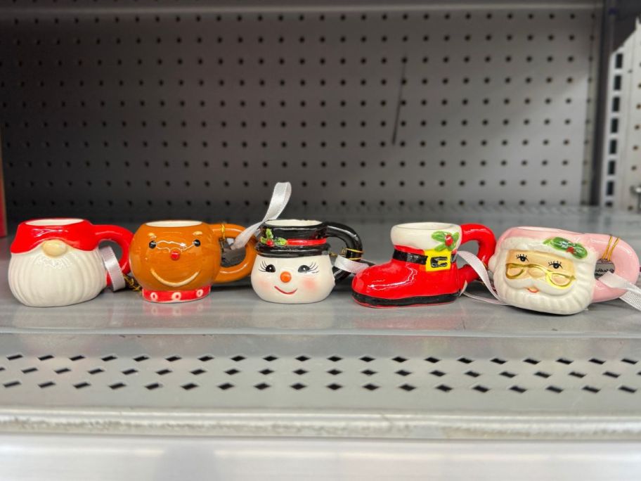 Mr. Christmas Nostalgic Mini Mug Ornaments on a shelf at Walmart