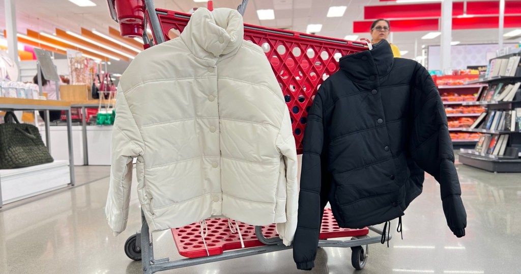 wild fable women's puffer jackets hanging on target cart