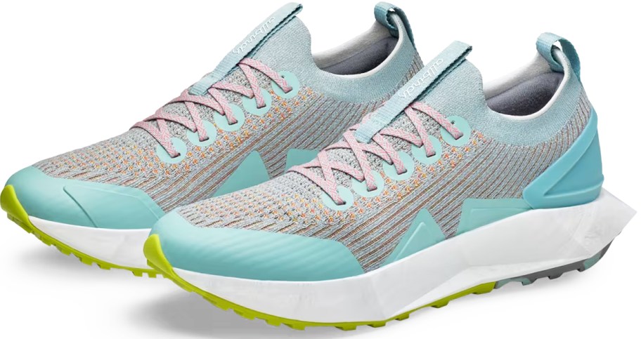 pair of blue, pink, and green running shoes