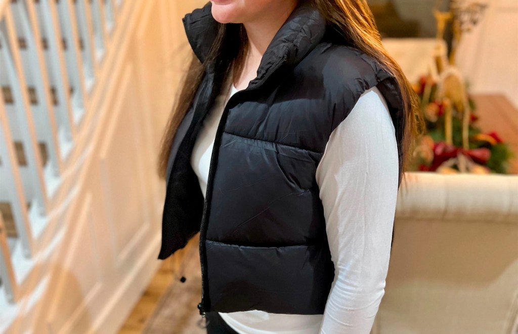 woman wearing black cropped vest