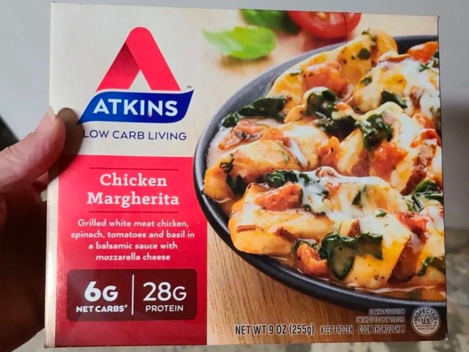 hand holding atkins frozen entree