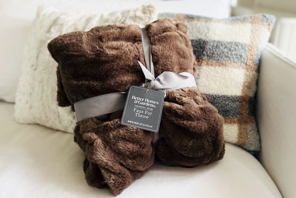 brown faux fur blanket wrapped in bow