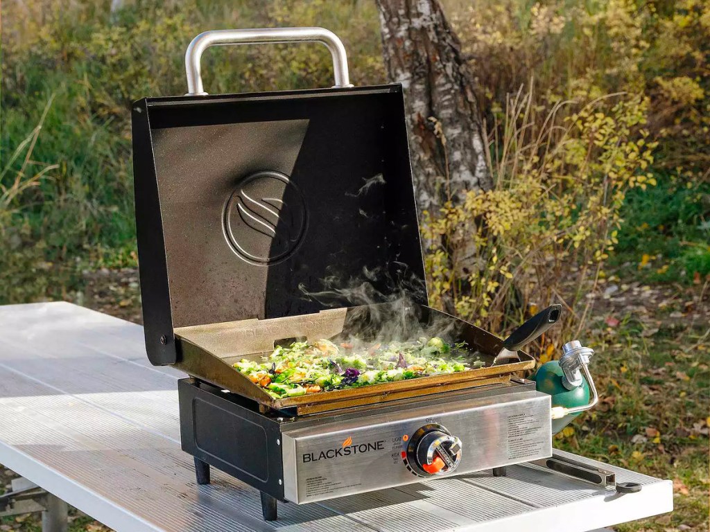 blackstone griddle on table outdoors