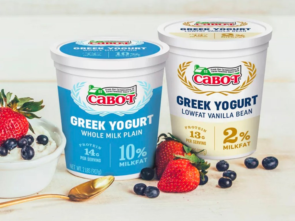 two cabot greek yogurt containers on table