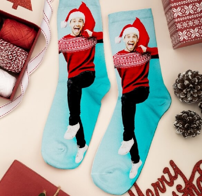 pair of custom canvas champ photo socks with a christmas design