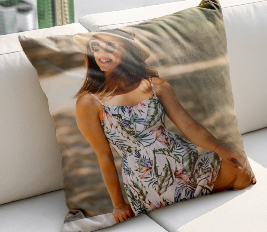 canvas champ custom photo pillow displayed on a couch