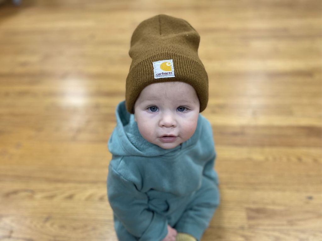 baby wearing Carhartt beanie