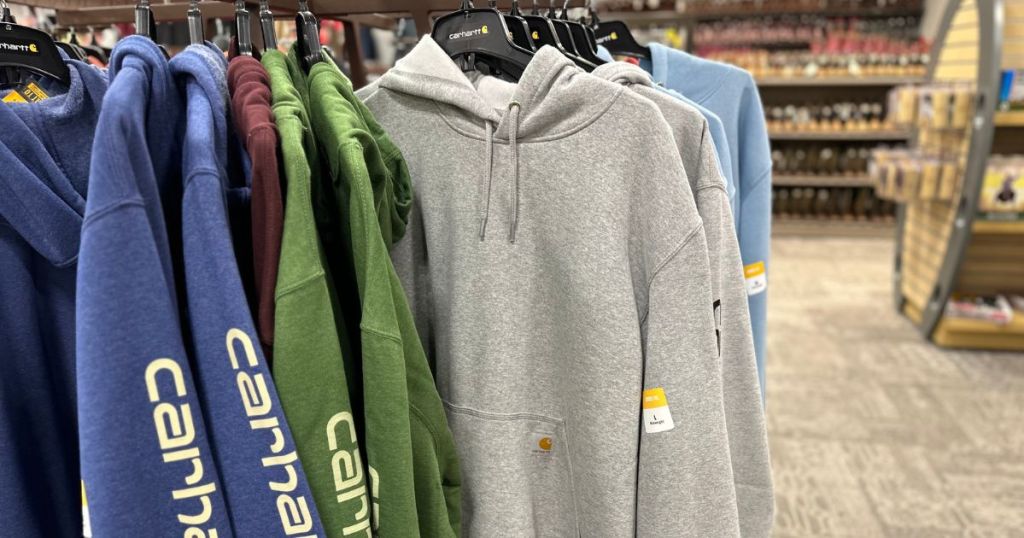rack of Carhartt hoodies in store