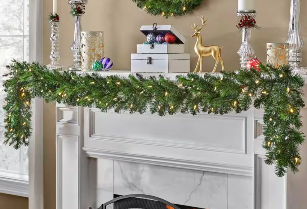 christmas garland on white mantel