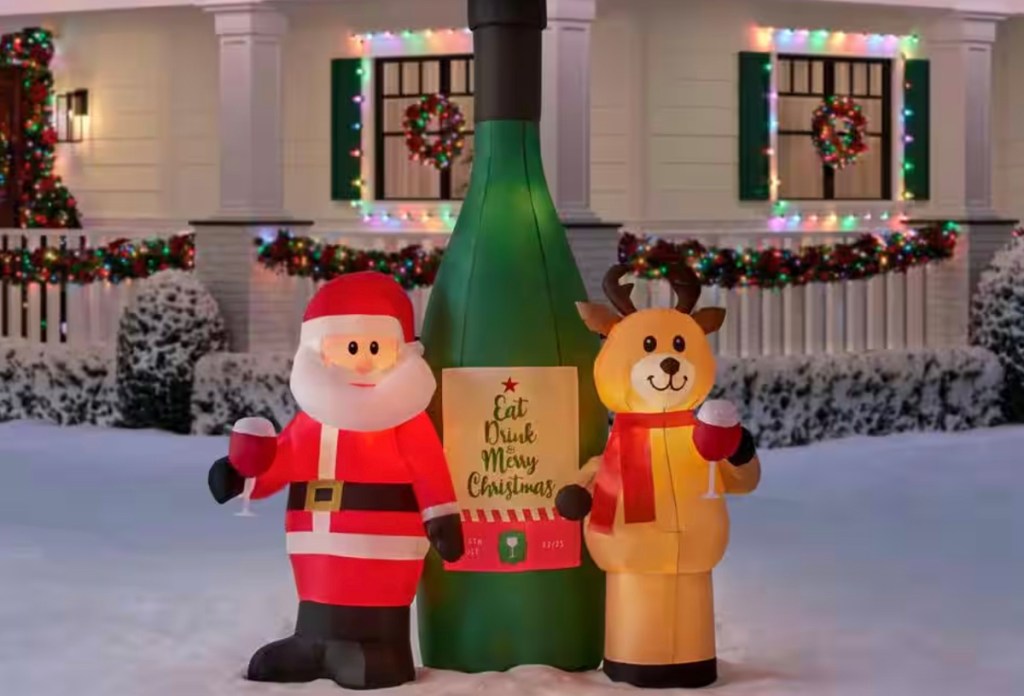 christmas wine inflatable with santa and reindeer outdoors 