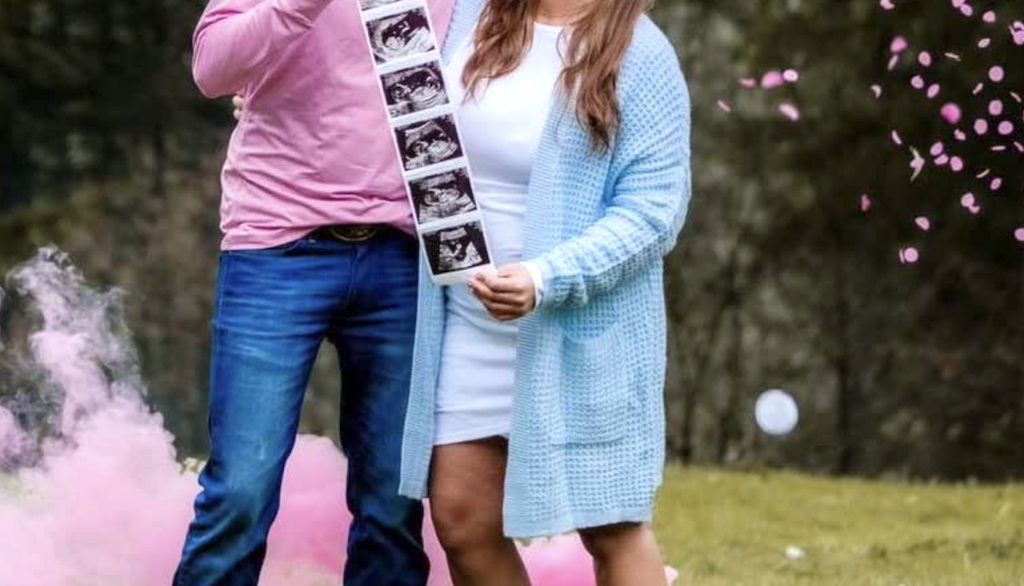 woman wearing chunky knit cardigan at baby reveal party 