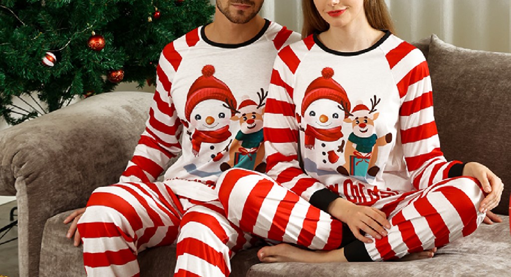 couples wearing matching Christmas pajamas