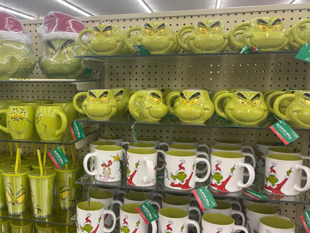 display of grinch mugs and tumblers