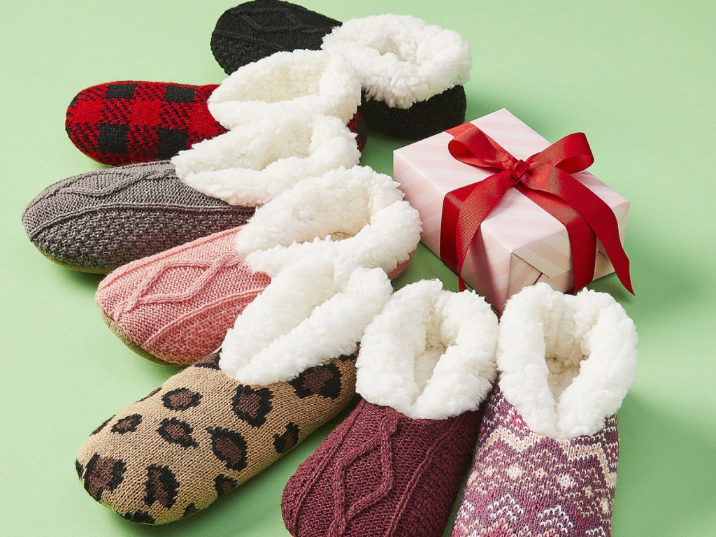 display of women's slippers with a. gift box
