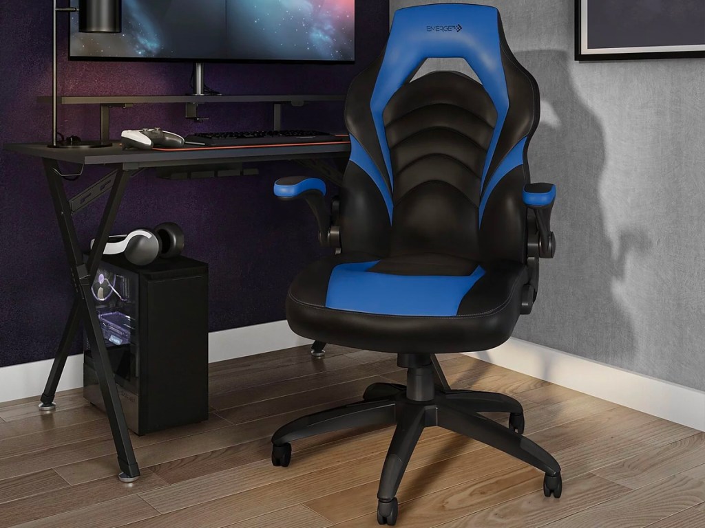 blue and black gaming chair in room with computer