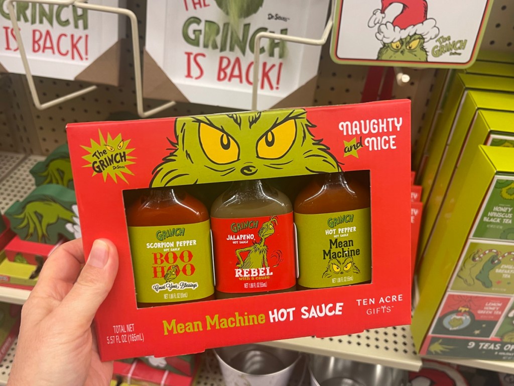 hand holding mean machine hot sauce set at the hobby lobby store