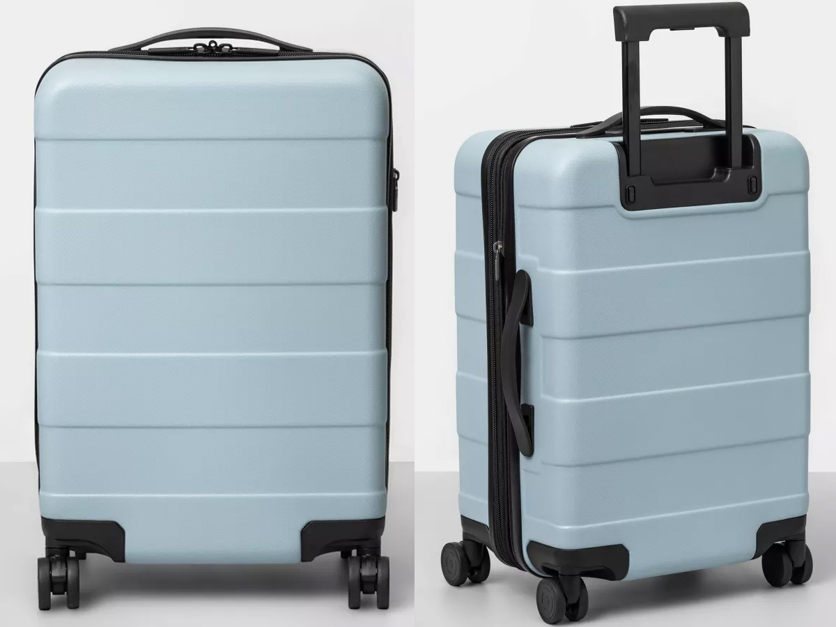 Made By Design Hardside Carry On Spinner Suitcase in light blue stock images
