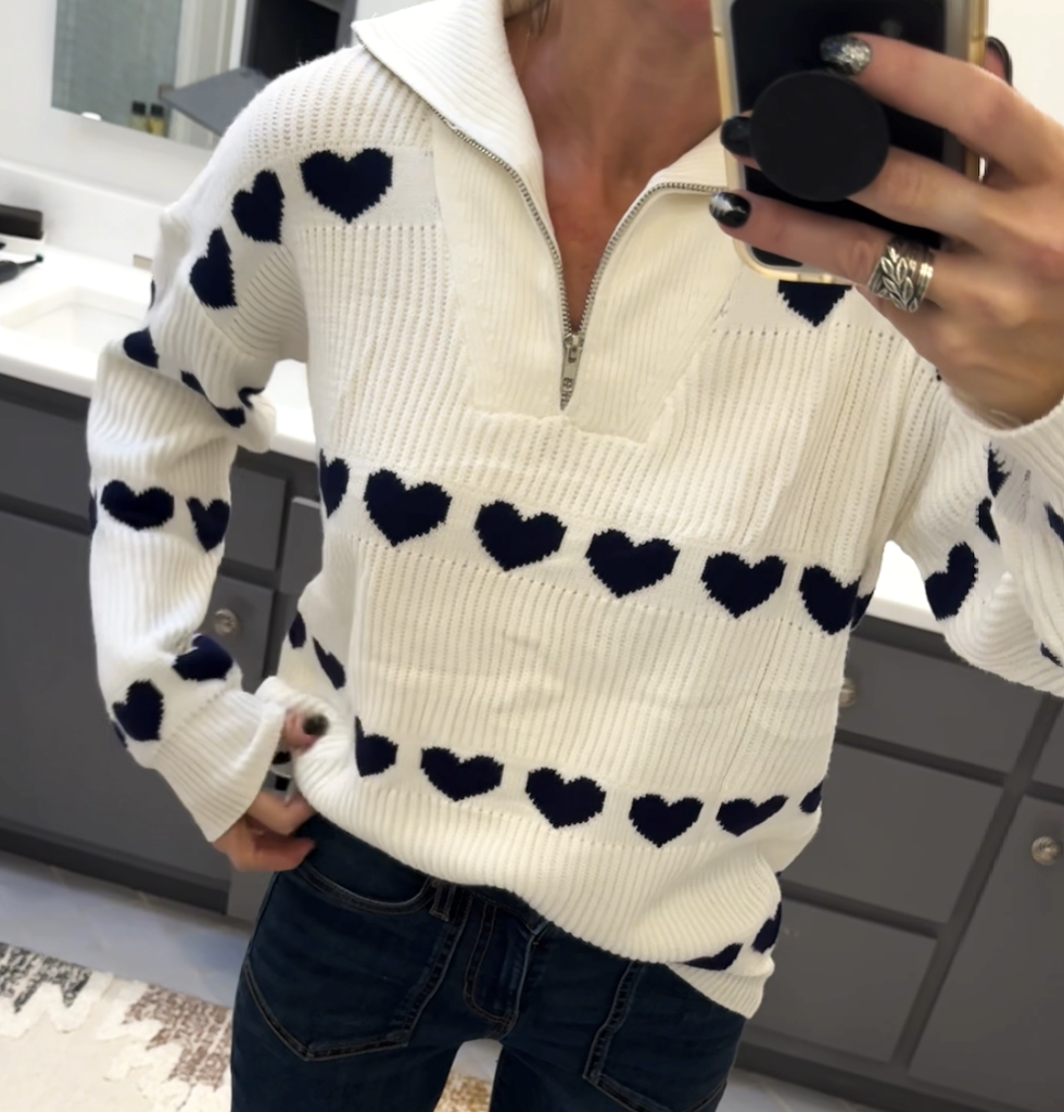 woman wearing heart sweater 