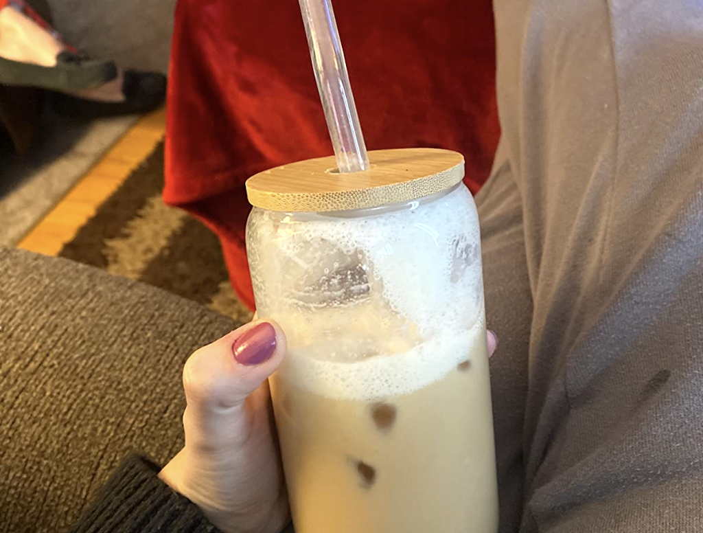 https://hip2save.com/wp-content/uploads/2023/11/holding-iced-coffee-drink-in-glass-cup.png?resize=1024%2C776&strip=all