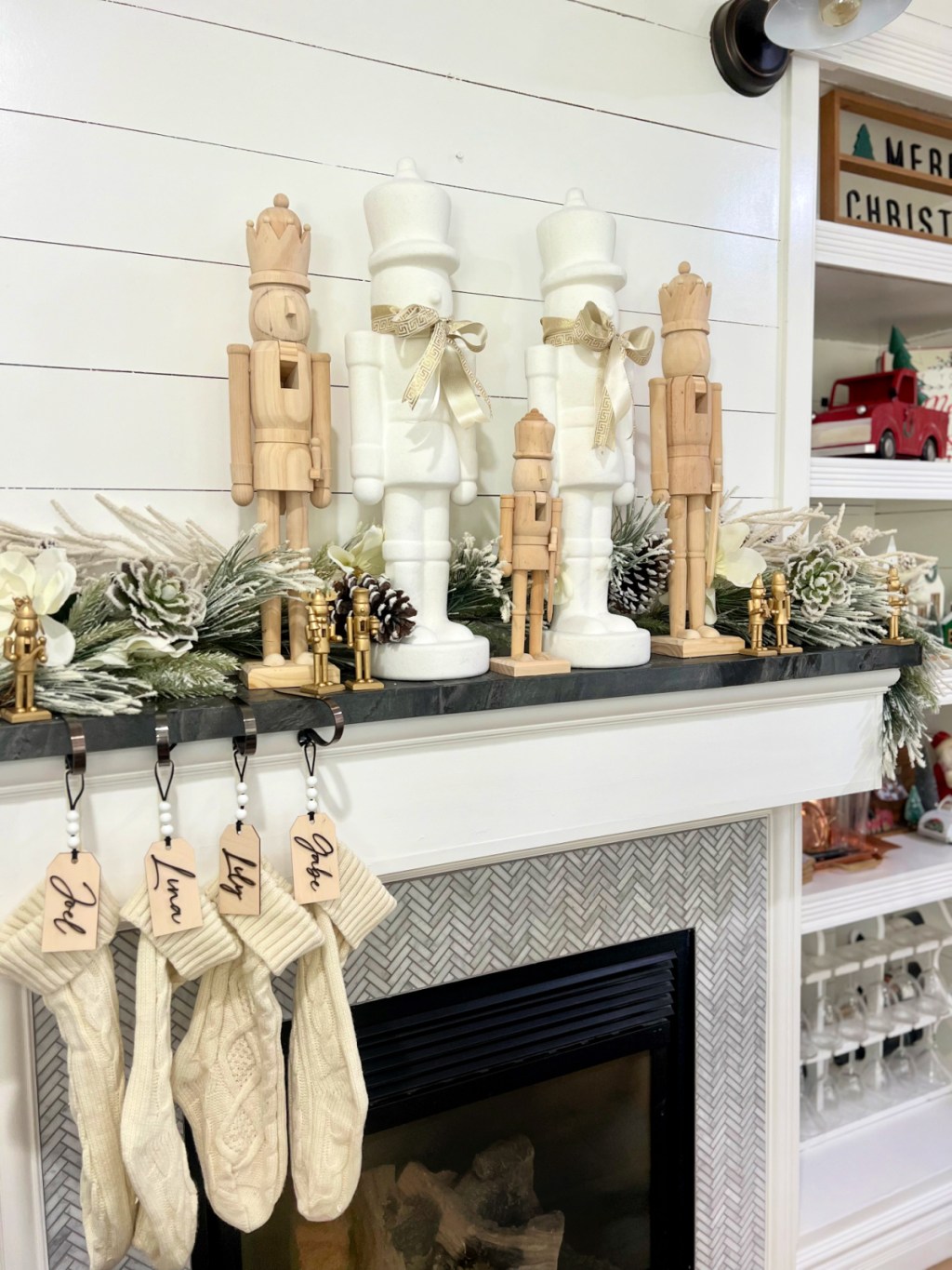 holiday mantel with wooden nutcrackers