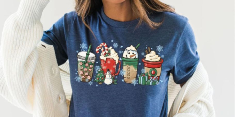 Christmas Graphic Tees from $12.79 Shipped | Starbucks, The Grinch, Swiftmas & More