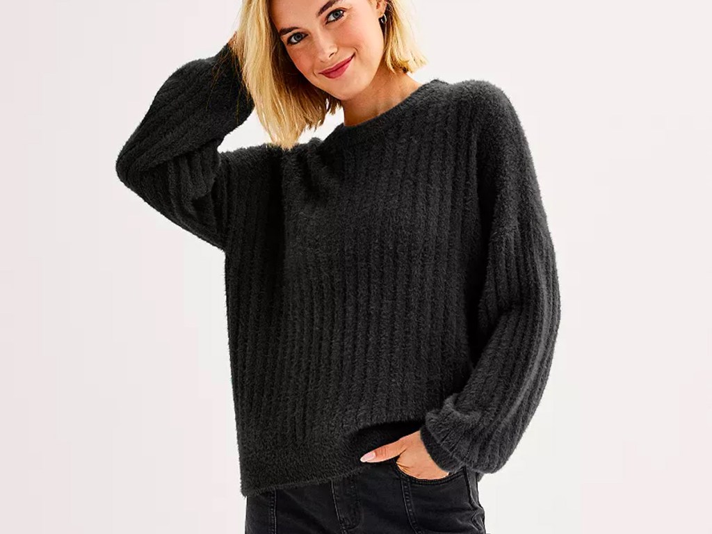 woman wearing black sweater