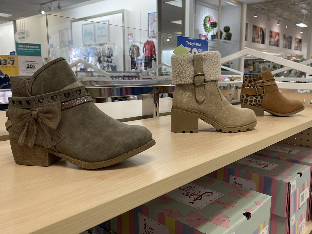 kids boots on display in belk store