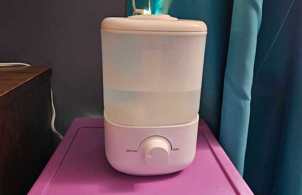 close up of white humidifier on purple box
