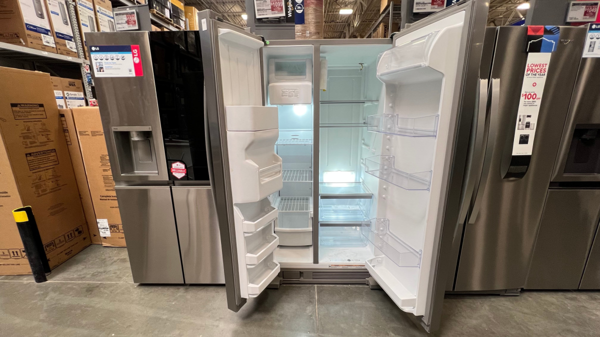 open whirlpool refrigerator on display at lowe's